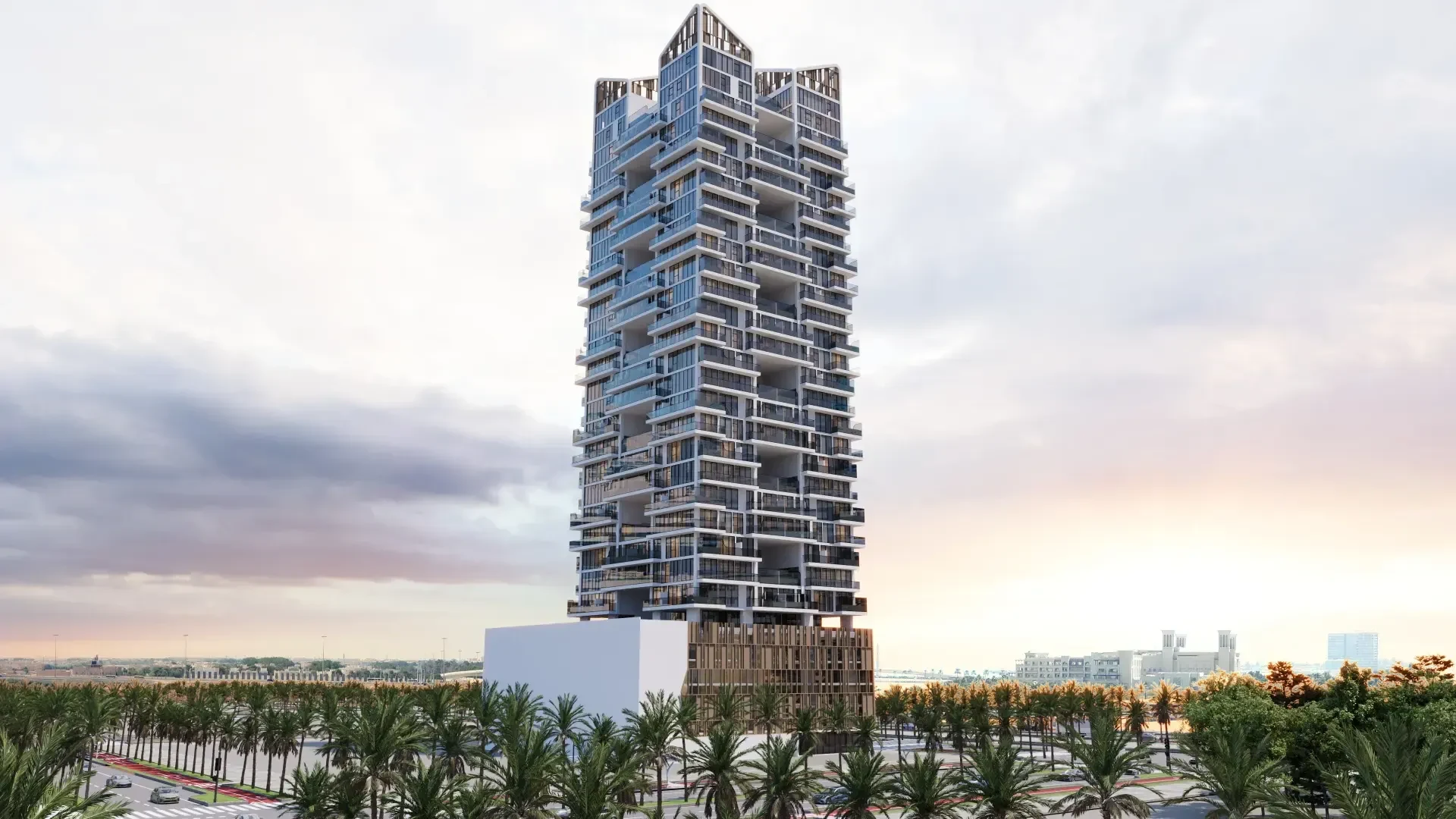 Gharbi II tower exterior at dusk