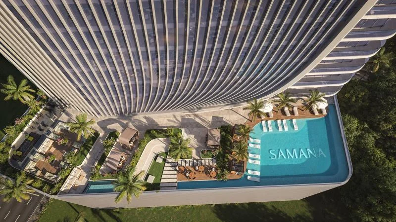 Elevated view of the pool and landscaped terrace at SAMANA Business Hub